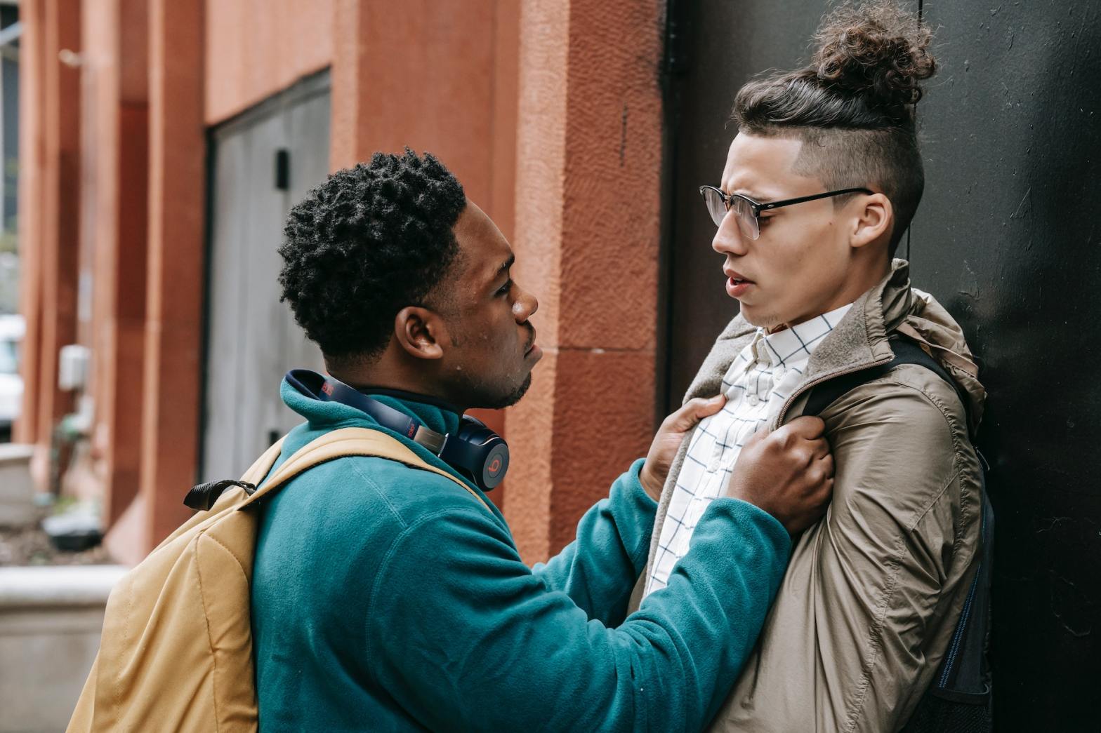 man confronting another man understanding a bully